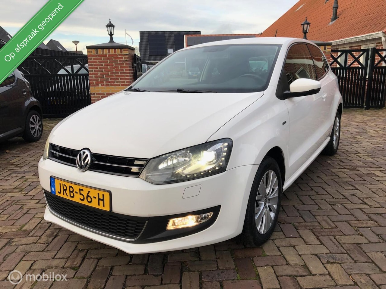 Volkswagen Polo - 1.2 Xenon/LED Cruise Clima - AutoWereld.nl