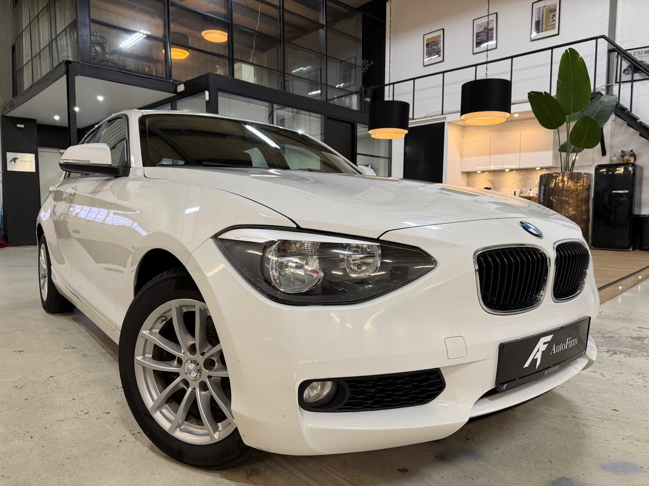 BMW 1-serie - Nette Auto Dealer onderhouden Parkeersensoren Garantie Stoelverwarming Boardcomputer - AutoWereld.nl