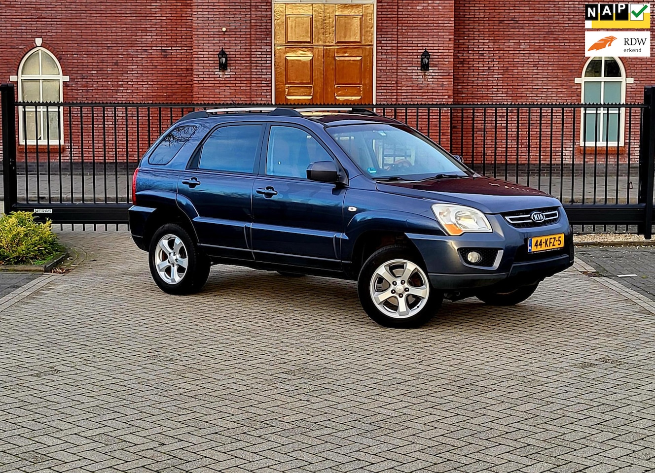 Kia Sportage - 2.0 CVVT Fifteen / Airco / Cruise control / Stoelverwarming / Open dak - AutoWereld.nl