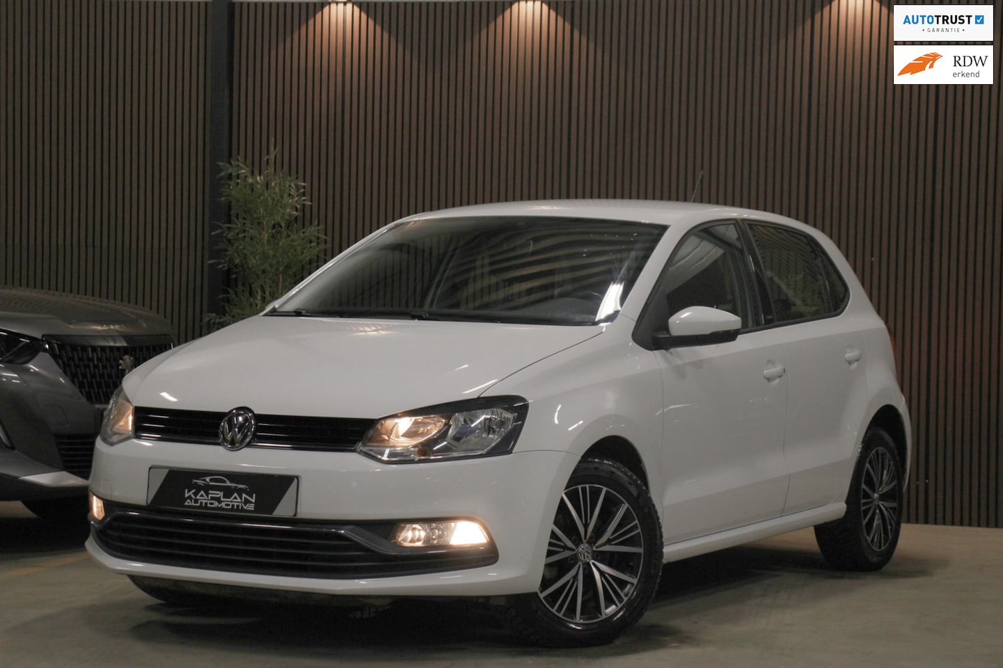 Volkswagen Polo - 1.2 TSI Allstar Cruise Navi CarPlay Bluetooth A/C - AutoWereld.nl