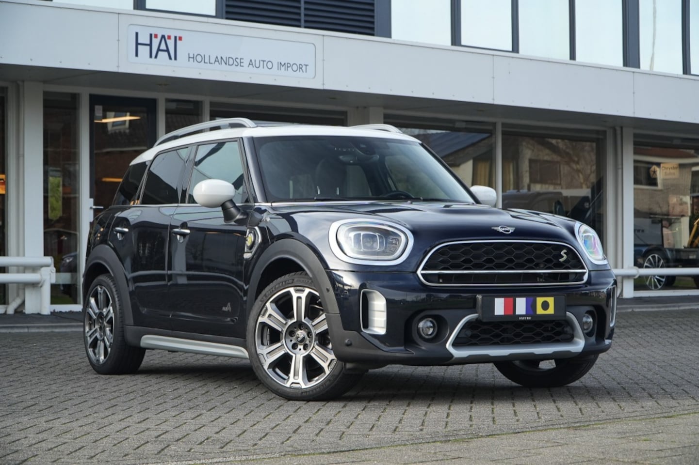MINI Countryman - Mini 2.0 Cooper S E ALL4 I Pano I ACC I Head-up - AutoWereld.nl