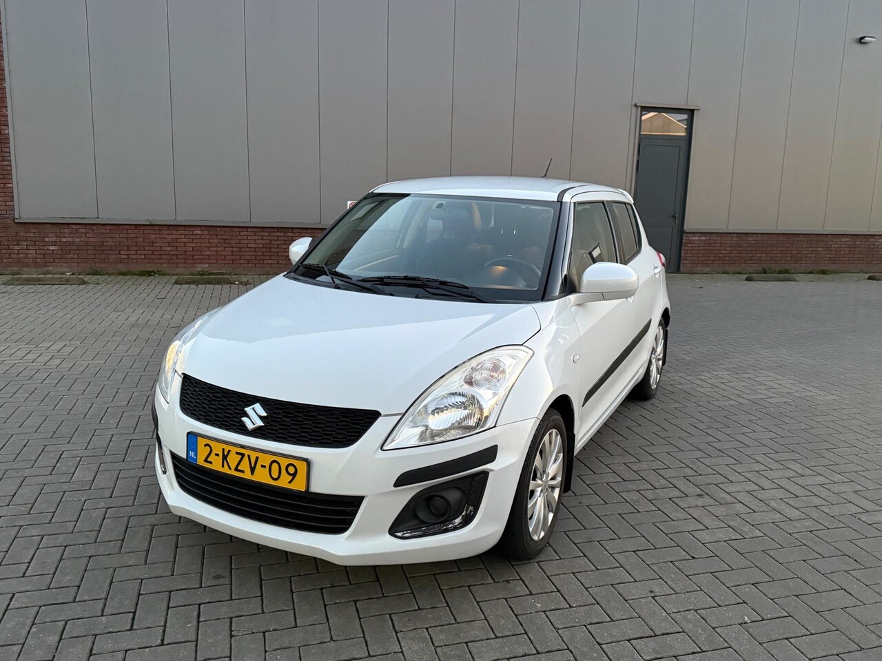 Suzuki Swift - 1.2 Bandit EASSS UNIEKE KM 42,000 NAP Airco Wit 2013 - AutoWereld.nl