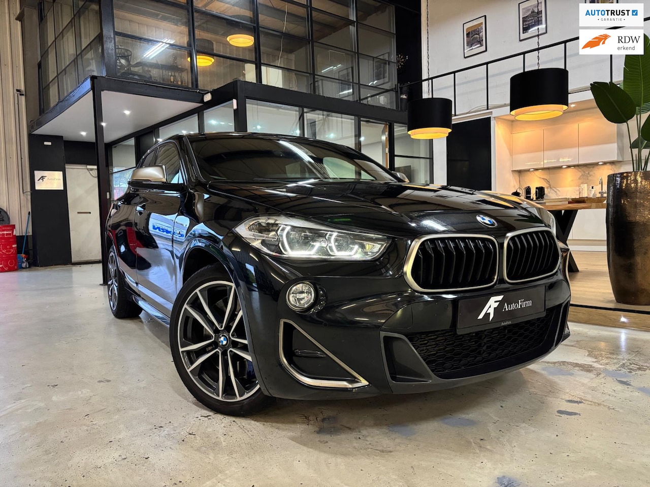 BMW X2 - M35i 306 PK Steptronic automaat Navigatie Trekhaak LED verlichting VOL lederen bekleding S - AutoWereld.nl
