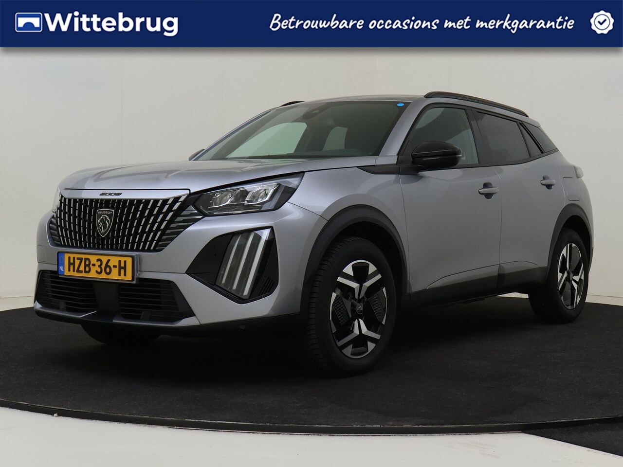 Peugeot 2008 - 1.2 Hybrid 136 Allure | Stoelverwarming | Remote services | Parkeersensoren achter | Cruis - AutoWereld.nl