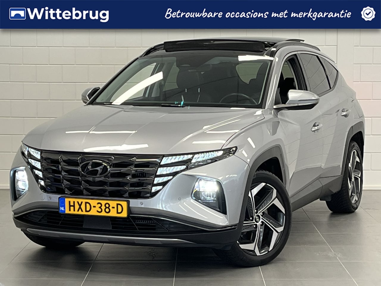 Hyundai Tucson - 1.6 T-GDI HEV Premium Sky LEDER | FULL LED | SCHUIFDAK | FULL OPTIONS! - AutoWereld.nl