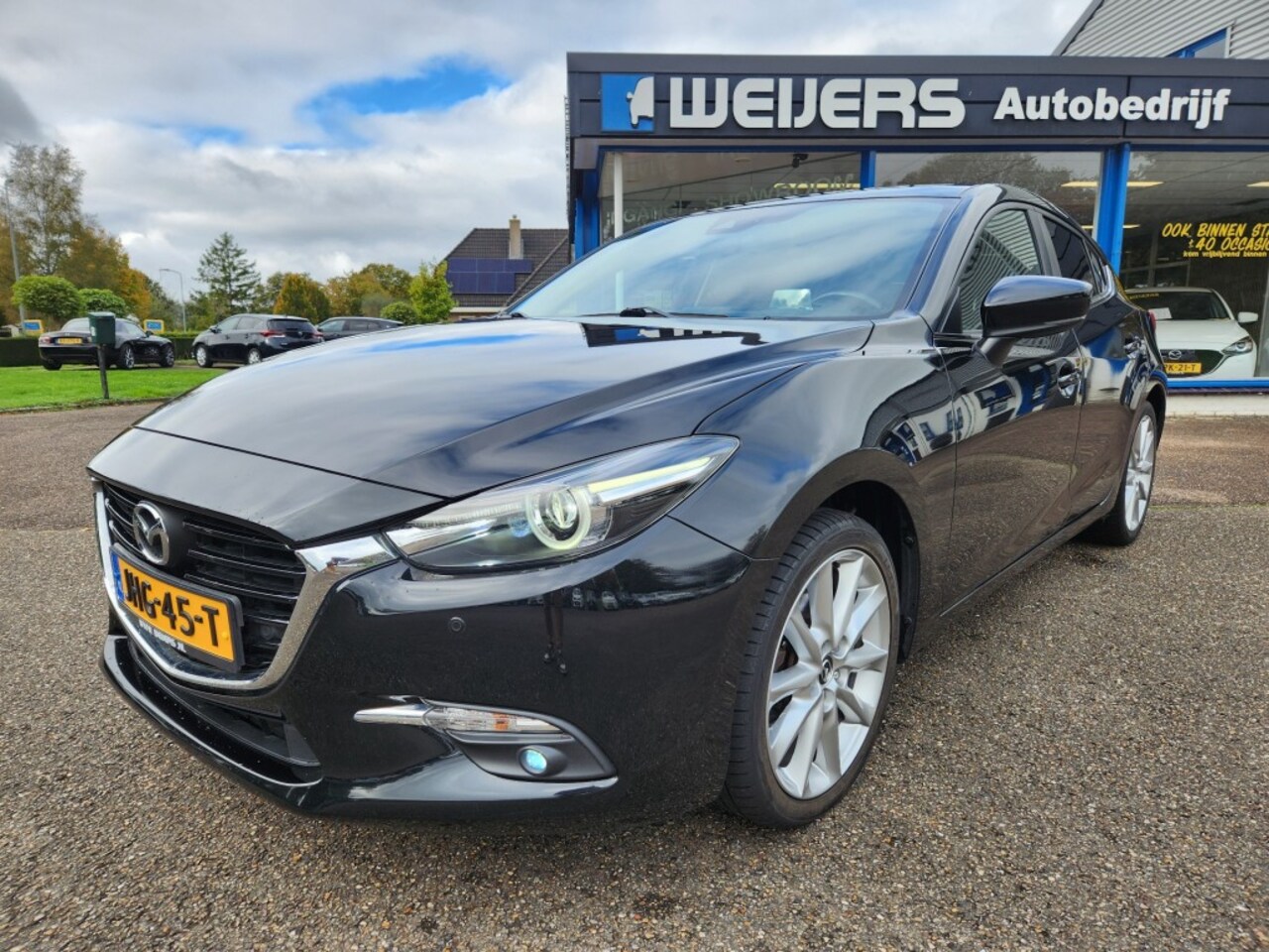 Mazda 3 - 2.0 Skyactiv-G 120pk GT-M, Navi, Camera, Head-up, Trekhaak, Stuurverwarming PDC V+A - AutoWereld.nl