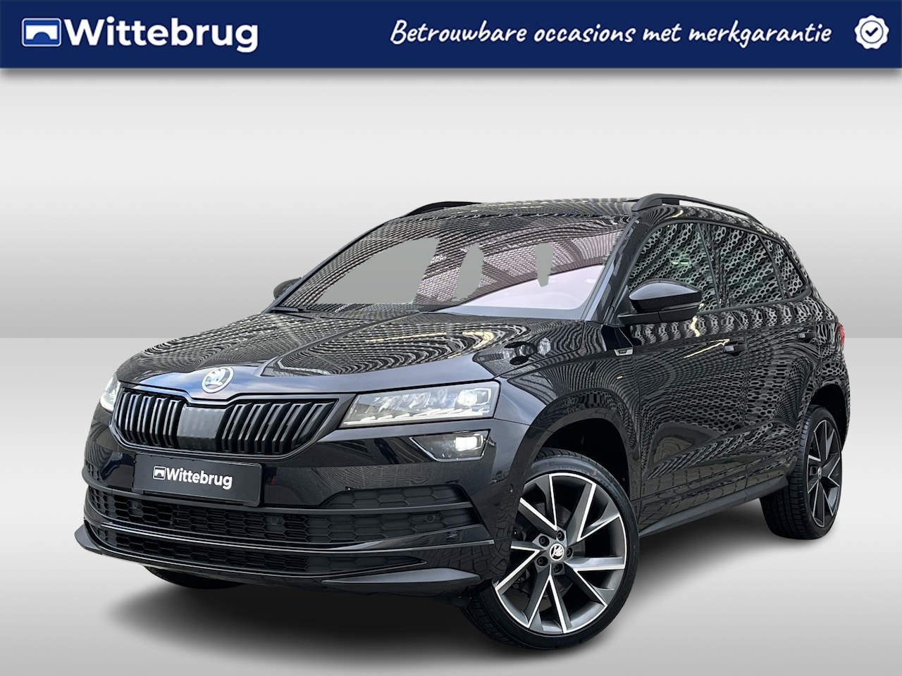 Skoda Karoq - 1.5 TSI 150PK ACT Sportline Business / Panoramadak / Standkachel / Stuur + Stoelverwarming - AutoWereld.nl