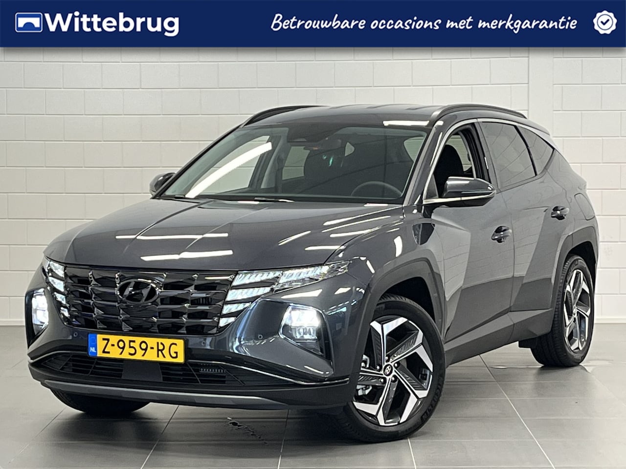 Hyundai Tucson - 1.6 T-GDI PHEV Comfort Smart 4WD FULL LED | KEYLESS | NAVIGATIE | RIJKLAAR! - AutoWereld.nl