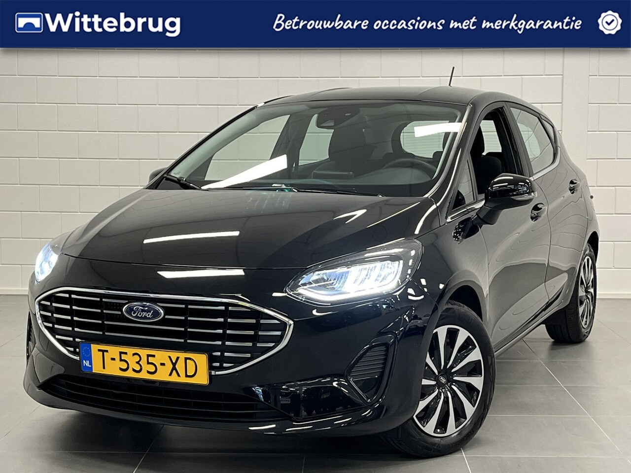 Ford Fiesta - 1.0 EcoBoost Hybrid Titanium ANDROID / APPLE NAVIGATIE | LED KOPLAMPEN | PARKEERSENSOREN - AutoWereld.nl