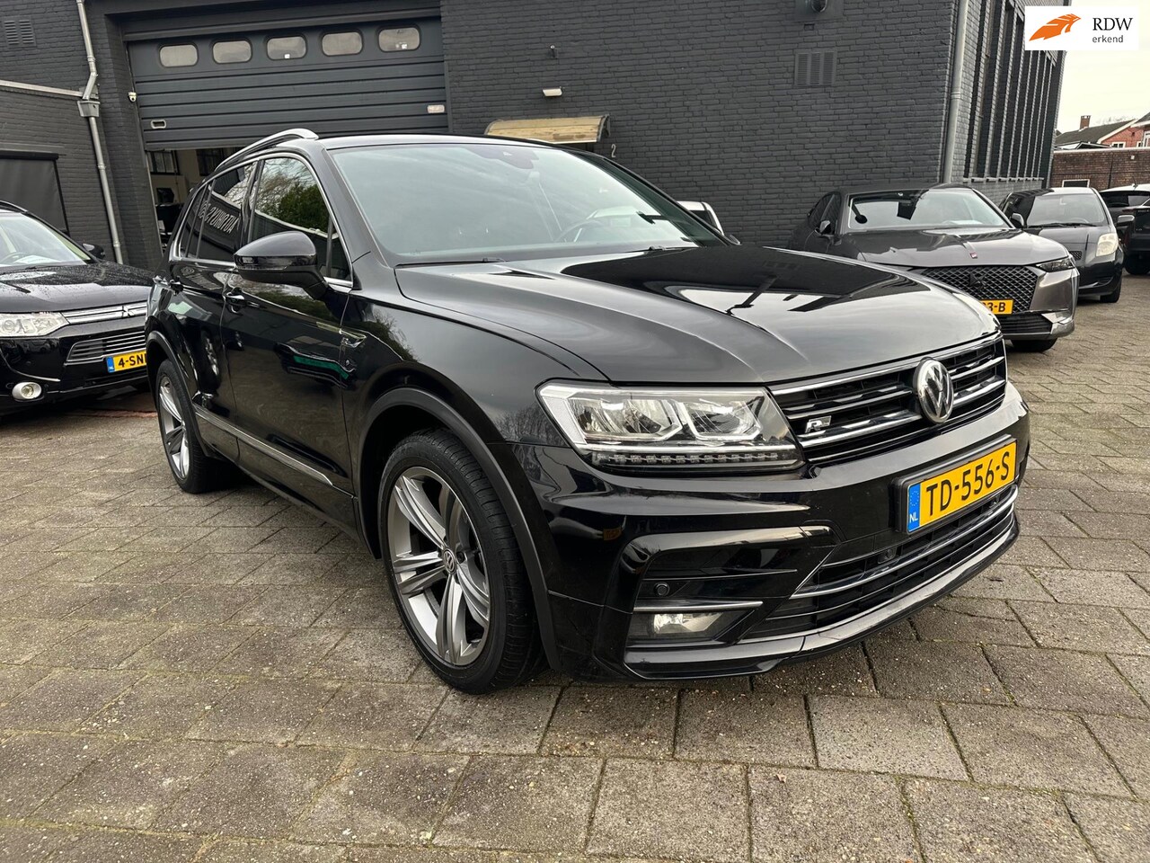 Volkswagen Tiguan - 1.4 TSI Comfortline Business R 1.4 TSI (125pk) Comfortline Business R! Navigatie! - AutoWereld.nl