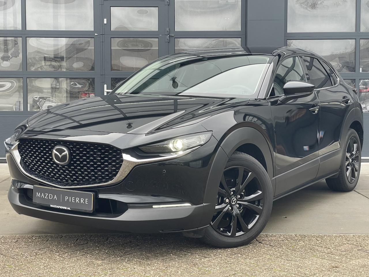 Mazda CX-30 - 2.0 e-SkyActiv-X M 186 pk Hybrid Homura AUTOMAAT | NAVI | ACHTERUITRIJCAMERA WINTERPAKKET - AutoWereld.nl