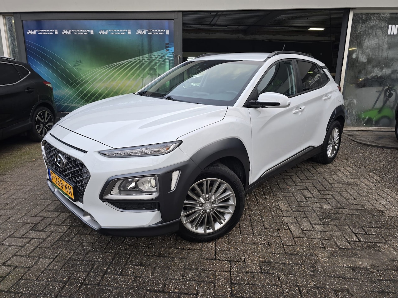 Hyundai Kona - 1.0T Comfort | 1E EIGENAAR | 12MND GARANTIE | STOELVERWARMING | NAVI | CAMERA | CRUISE - AutoWereld.nl