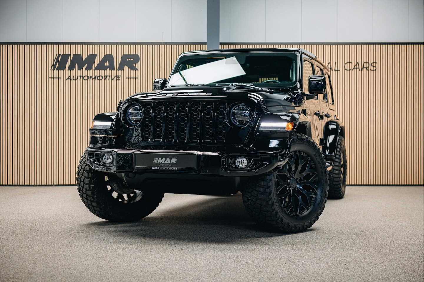 Jeep Wrangler Unlimited - 4xe 380 Rubicon Dikke Custom Made Jeep Wrangler, Cabrio top elektrische bedienbaar. - AutoWereld.nl