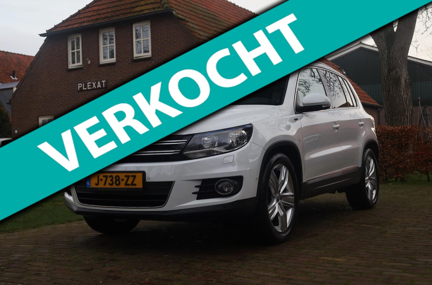 Volkswagen Tiguan - 1.4 TSI Edition Aut. | Panorama | Trekhaak | Stoelverwarming | Navigatie | 19 Inch | Facel - AutoWereld.nl