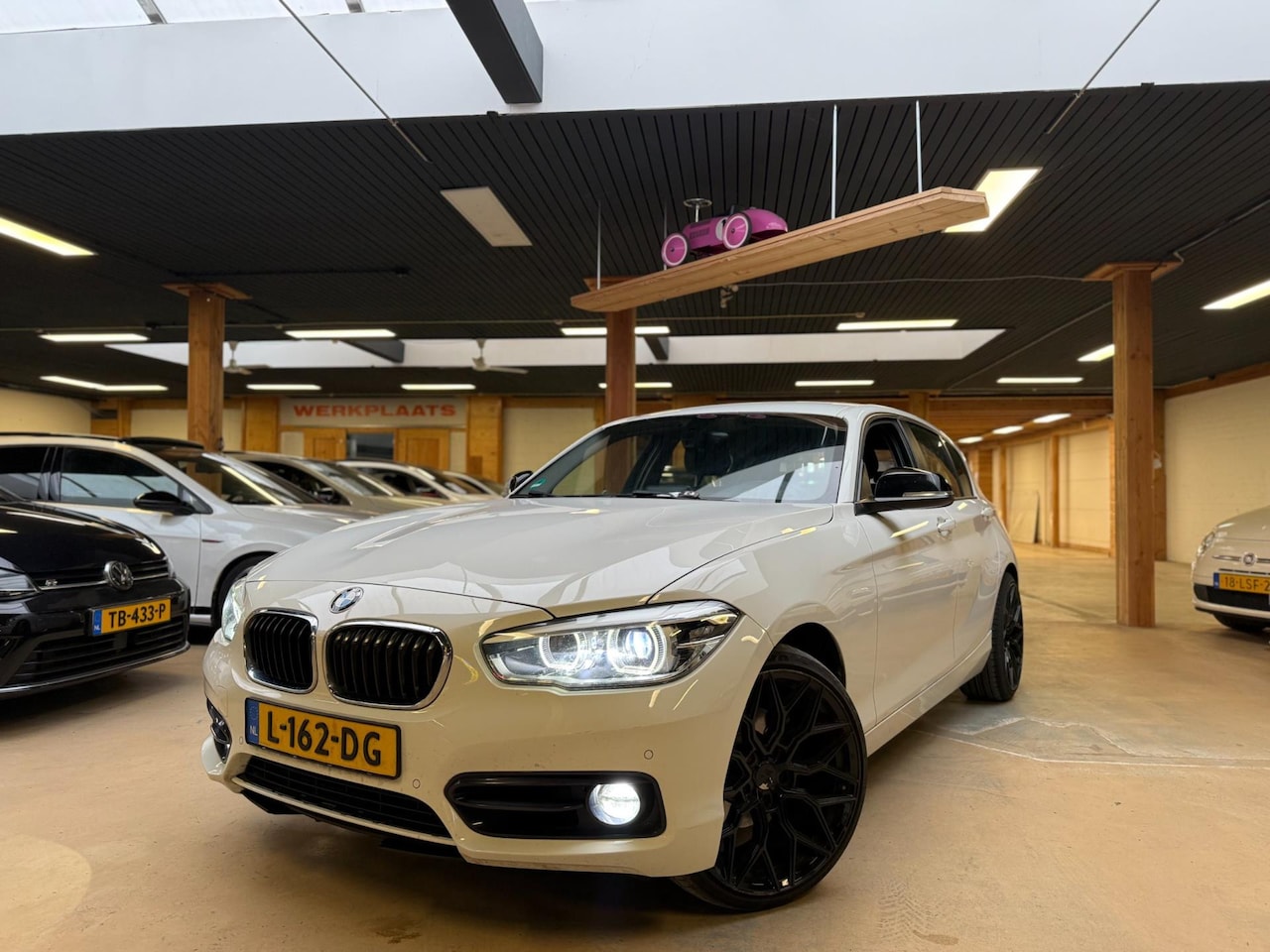 BMW 1-serie - 120d xDrive High Executive Trekhaak Xenon - AutoWereld.nl