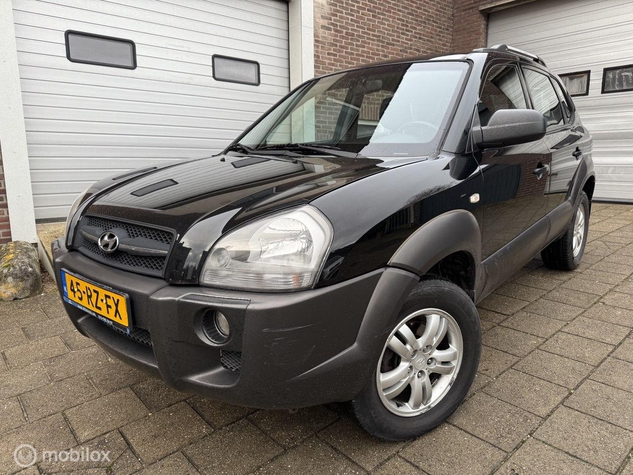 Hyundai Tucson - 2.0i Dynamic 2.0i Dynamic - AutoWereld.nl
