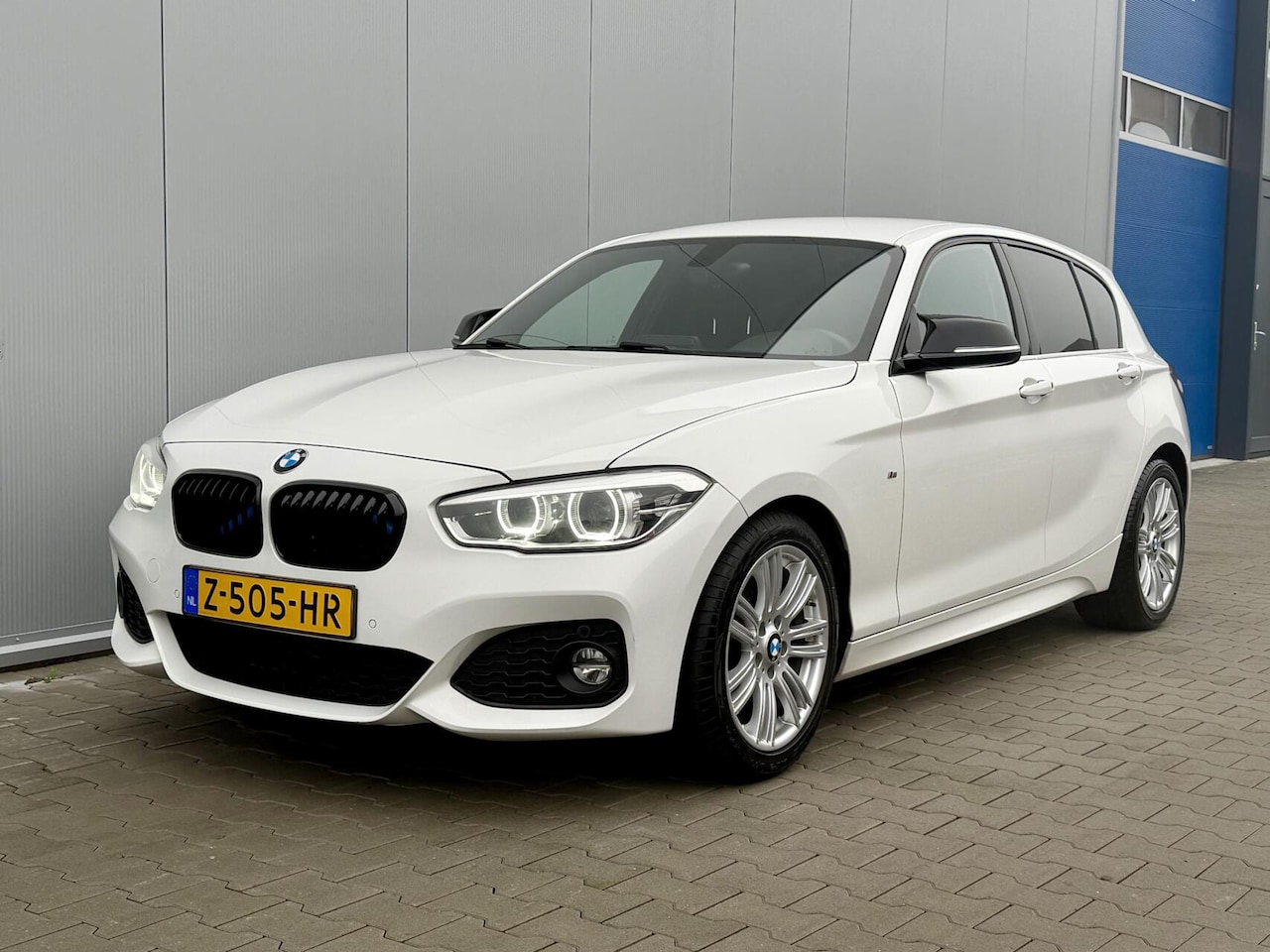 BMW 1-serie - 125i High Executive M-pakket - 224PK - Automaat - AutoWereld.nl