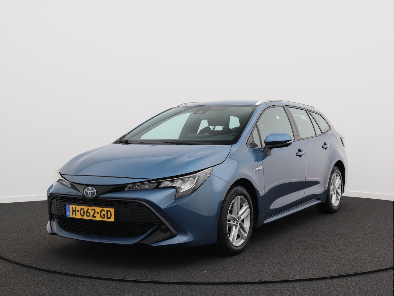 Toyota Corolla Touring Sports - 1.8 Hybrid Active/ lage km/ zeer mooi! - AutoWereld.nl