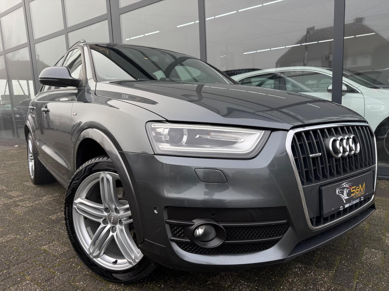 Audi Q3 - 2.0 TFSI quattro S Line Automaat | Leer - AutoWereld.nl