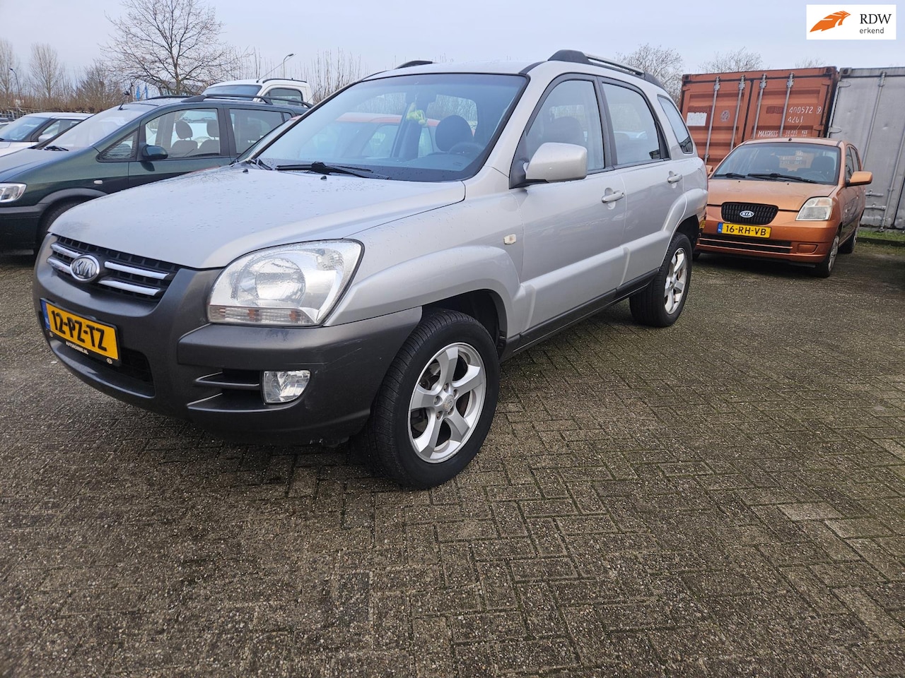 Kia Sportage - 2.0 CVVT Executive 2.0 CVVT Executive - AutoWereld.nl