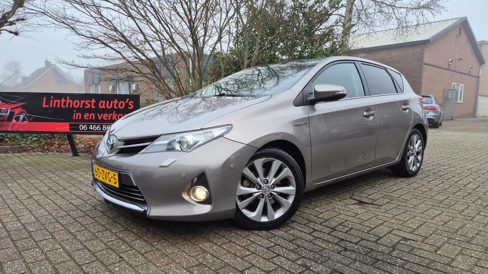 Toyota Auris - 1.8 Hybrid Lease Pro PANO-NAVI-213 - AutoWereld.nl