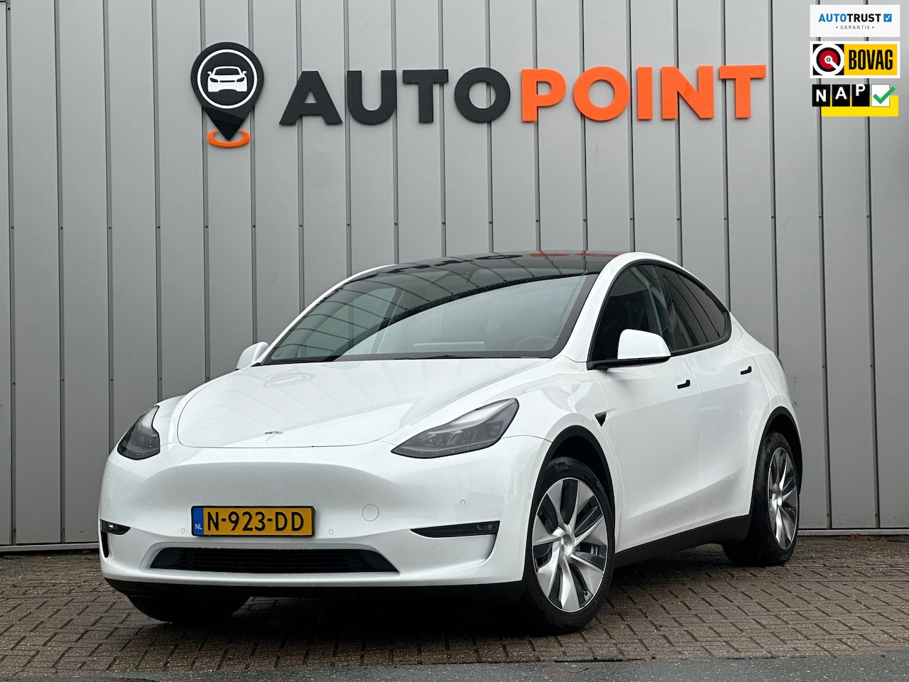 Tesla Model Y - Long Range AWD 75 kWh SOH 90% TREKHAAK PANO - AutoWereld.nl