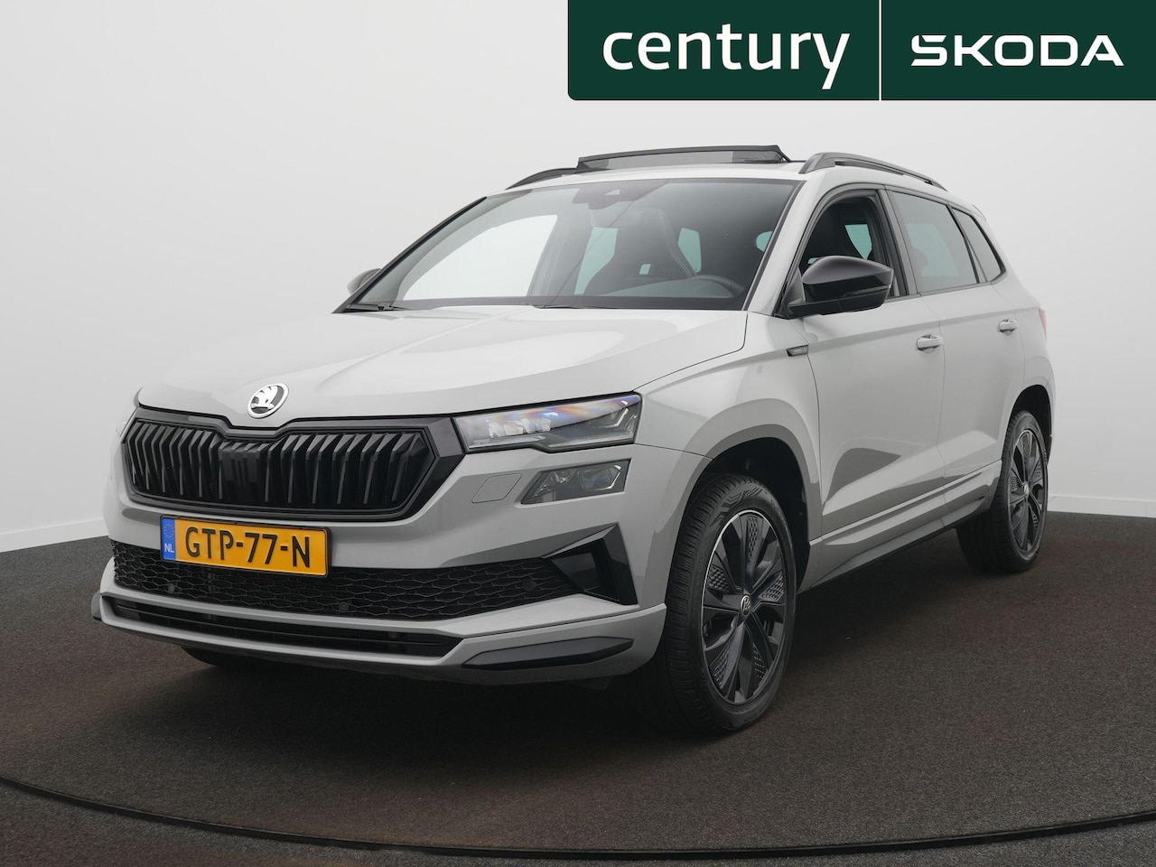 Skoda Karoq - 1.5 TSI ACT Sportline Business Panoramadak - Trekhaak - 18 Inch - Camera - AutoWereld.nl