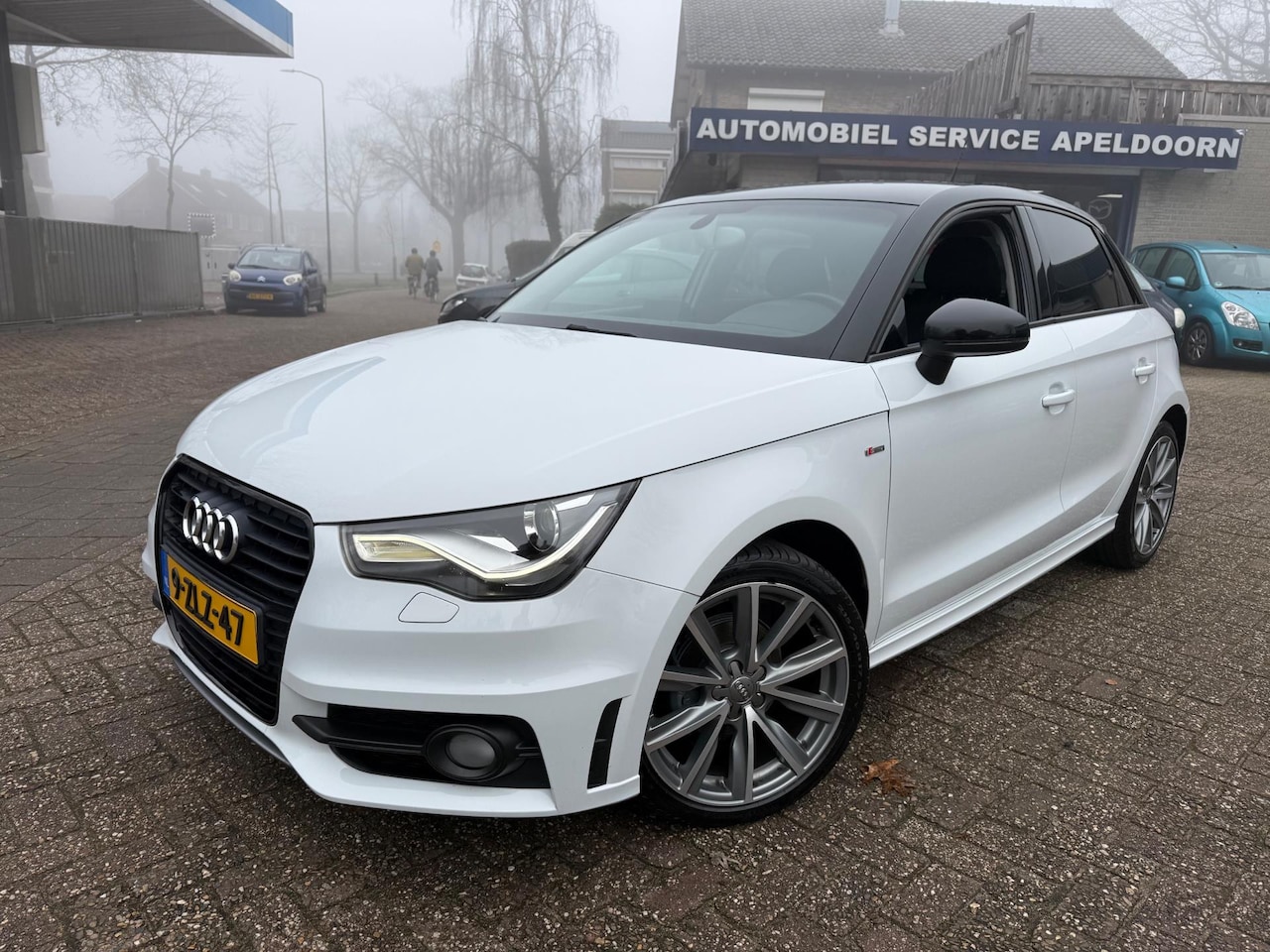 Audi A1 Sportback - 1.2 TFSI Admired NL AUTO *5DRS*CRUISE*AIRCO*NAVI*LM. VELGEN*DIML. AUTOM* - AutoWereld.nl