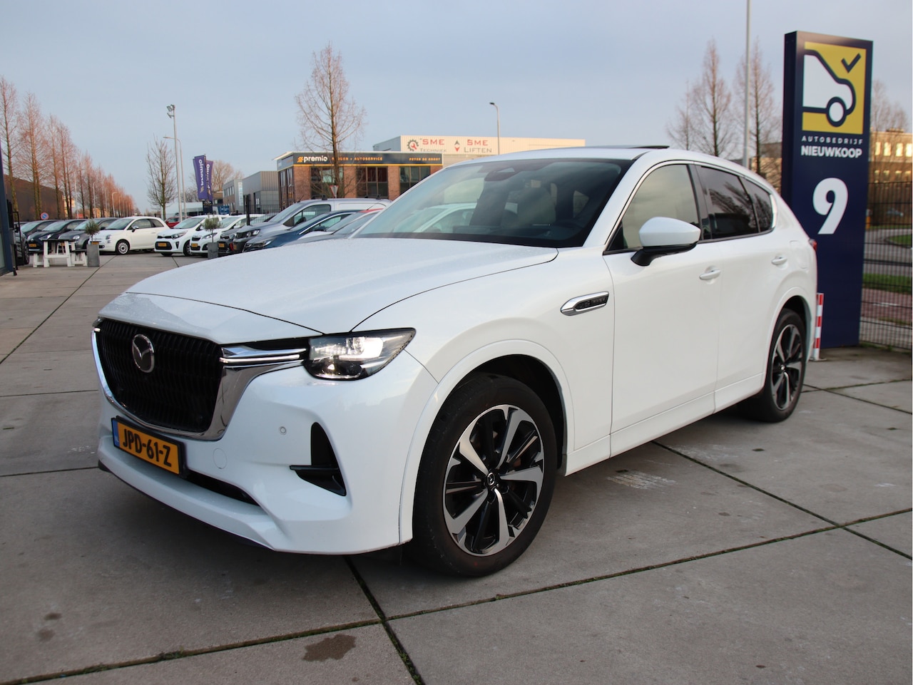 Mazda CX-60 - 2.5 e-SkyActiv PHEV Takumi Panorama dak, HUD - AutoWereld.nl