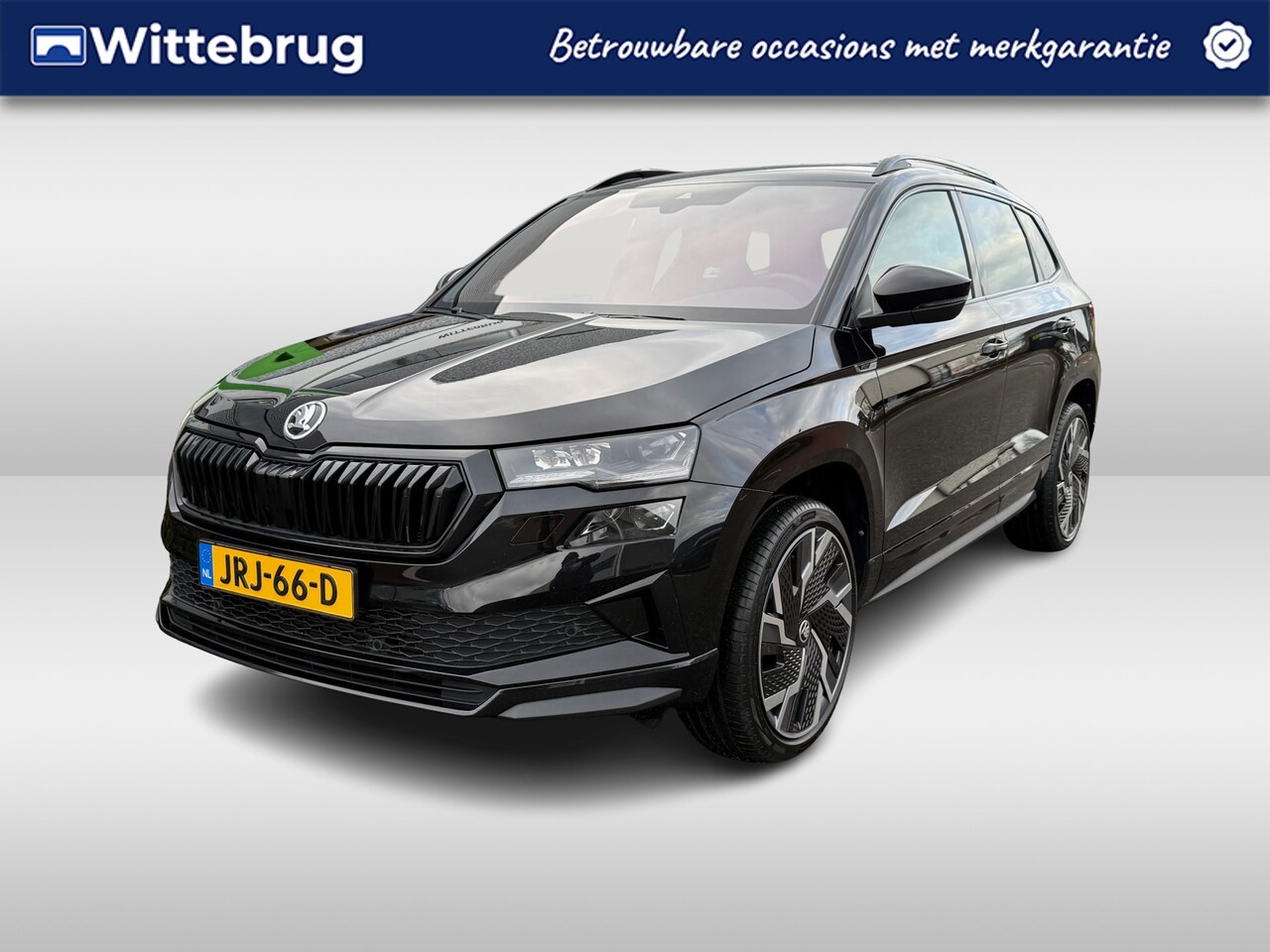Skoda Karoq - 1.5 TSI ACT Sportline Business / 19"LMV / CAMERA / Elektr. Klep / NAVI / APP.Connect / Ele - AutoWereld.nl