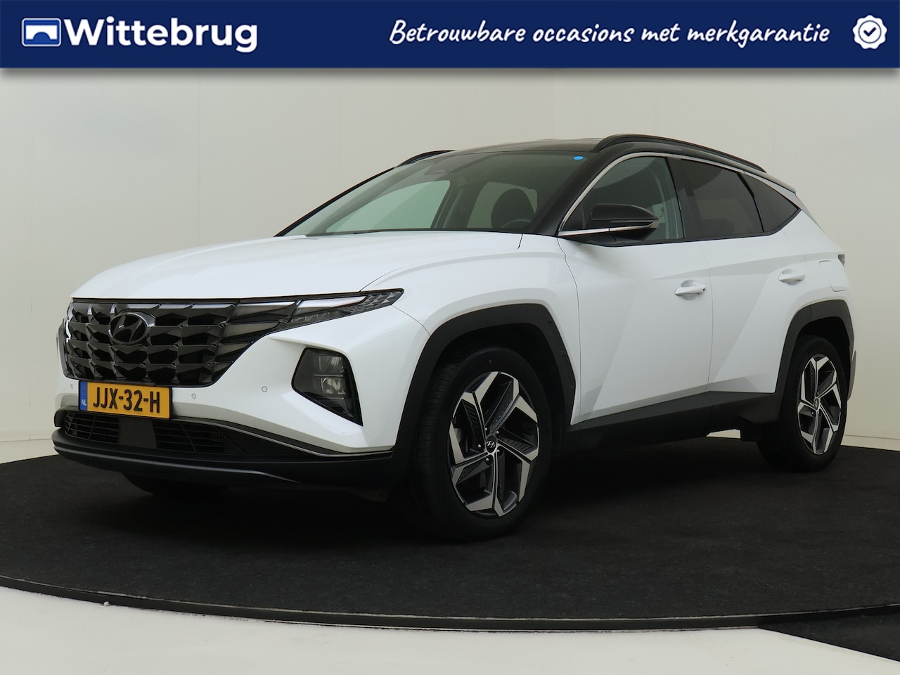 Hyundai Tucson - 1.6 T-GDI HEV Comfort Smart TWO TONE | 19 INCH VELGEN | AUTOMATISCHE ACHTERKLEP - AutoWereld.nl