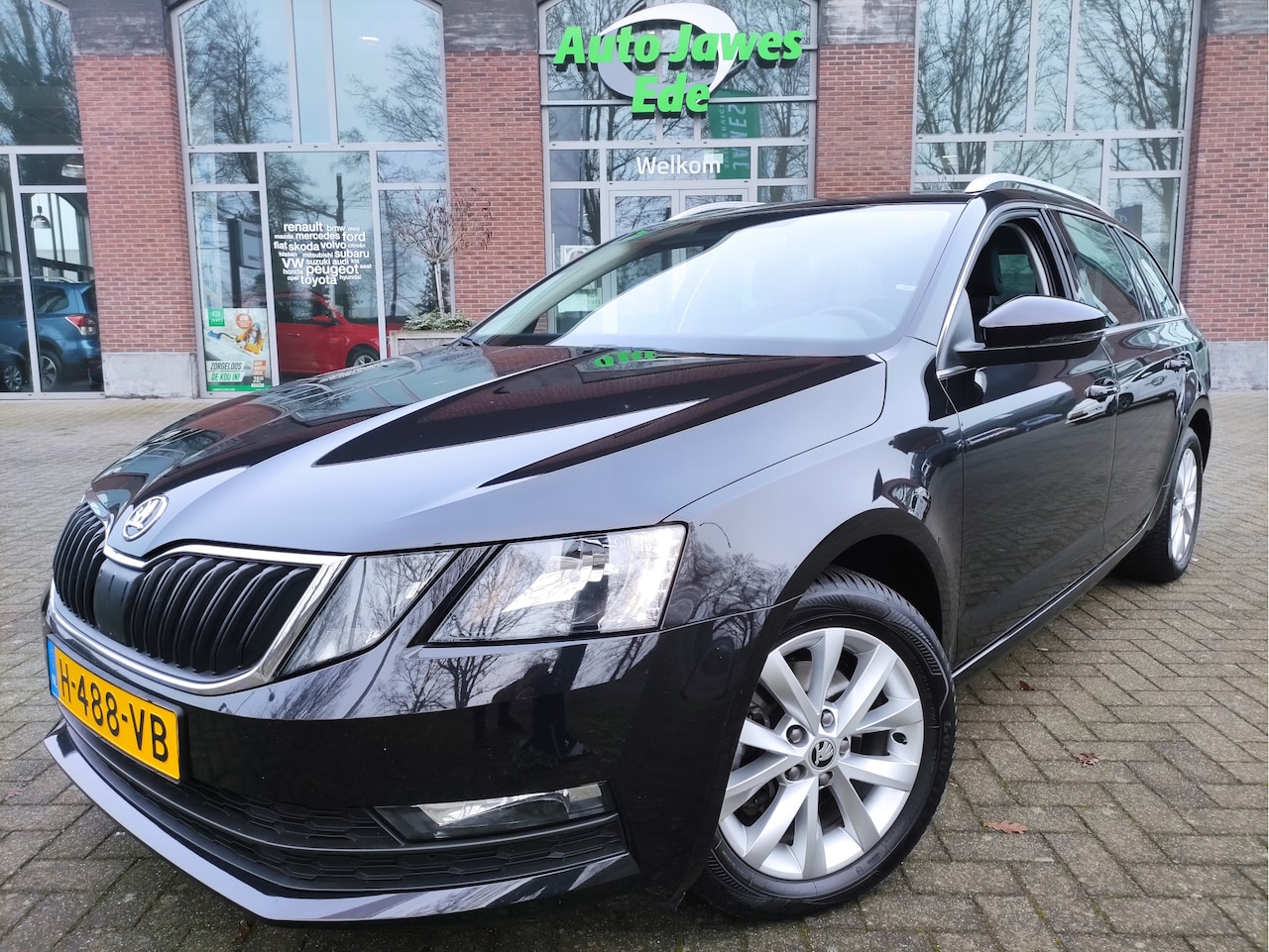 Skoda Octavia Combi - 1.5 TSI DSG Greentech Business Edition Afn.trekhaak - Stoelverwarming - Leder/Stof - Getin - AutoWereld.nl