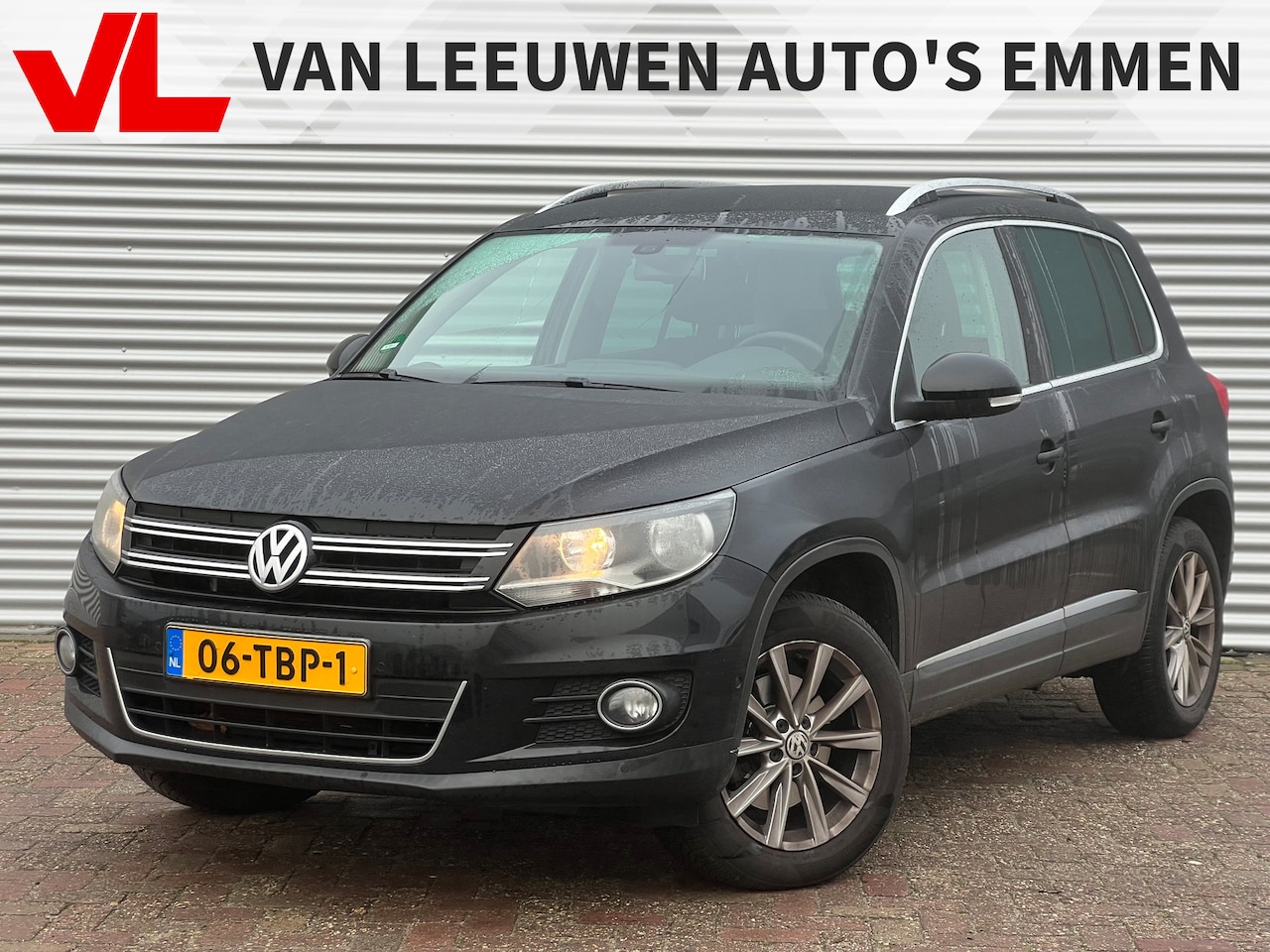Volkswagen Tiguan - 1.4 TSI Sport&Style | Cruise control | Navigatie | Parkeersensoren - AutoWereld.nl