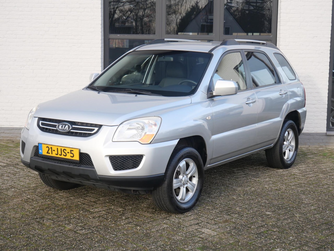 Kia Sportage - 2.0 CVVT X-pect Airco Pdc Elektr. Ramen Trekhaak - AutoWereld.nl