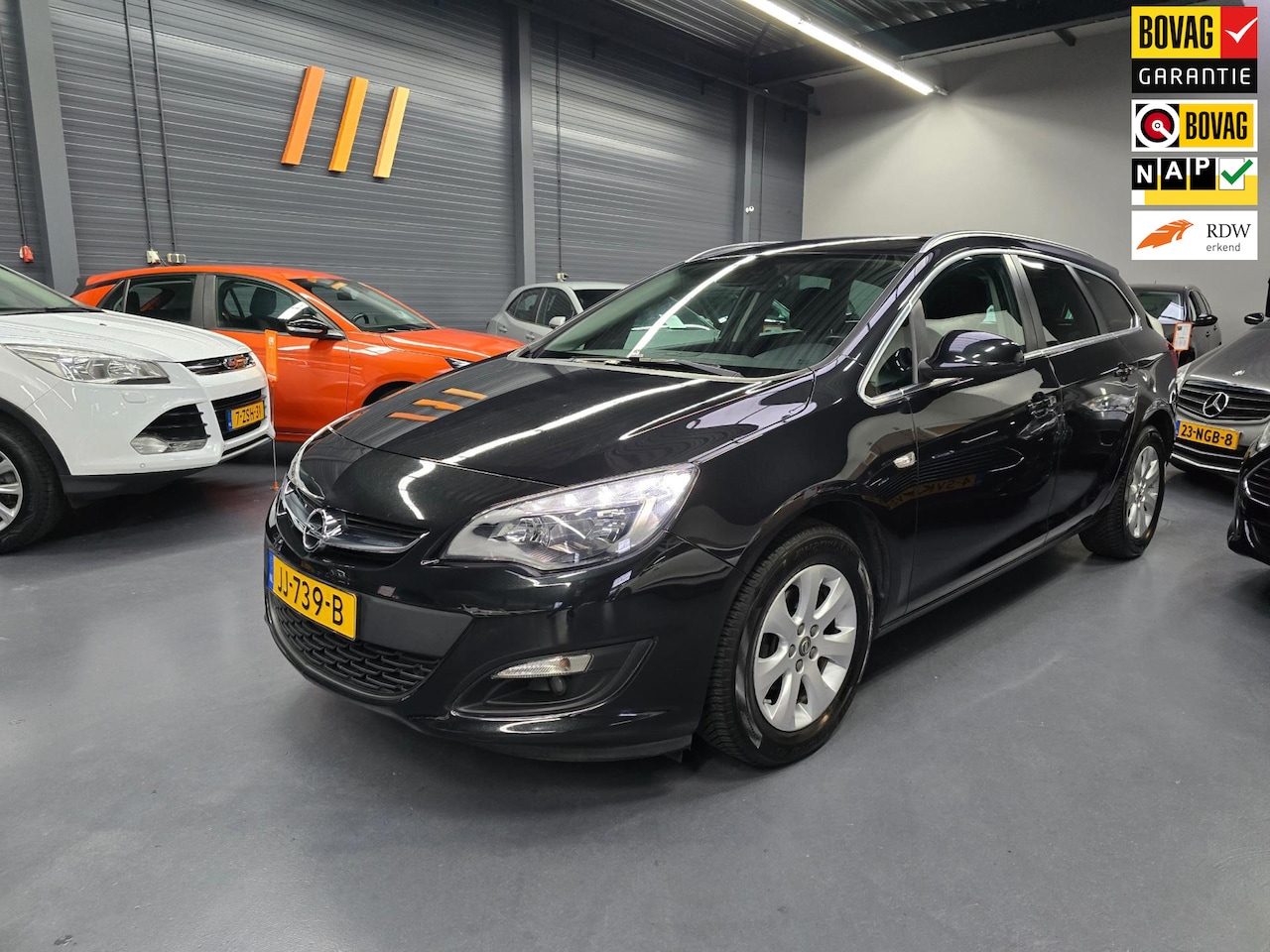 Opel Astra Sports Tourer - 1.4 Turbo Blitz NAVI PARKEERSENSOREN Bluetooth NAP NL AUTO - AutoWereld.nl
