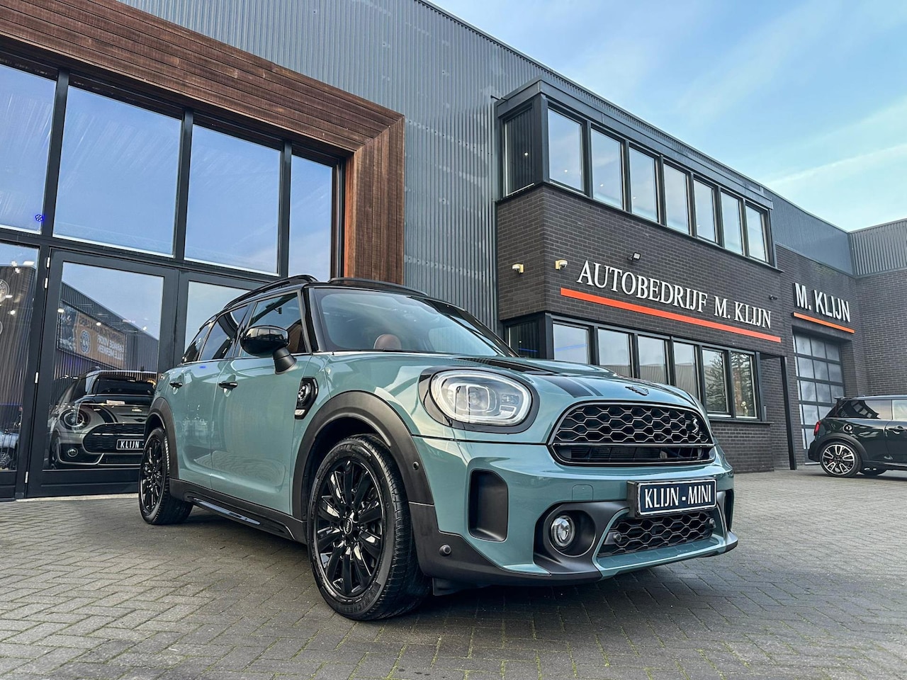 MINI Countryman - Mini 2.0 Cooper S E ALL4 ALL4 220pk/Chester brown leer/Memor/Pano/Camera/vol - AutoWereld.nl