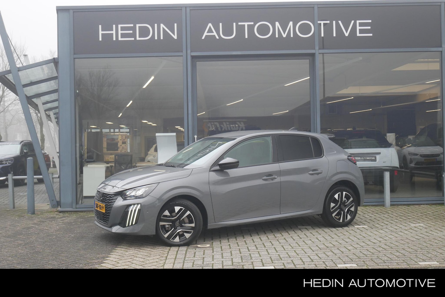 Peugeot 208 - 1.2 Hybrid | Navigatie | Achteruitrijcamera | Apple Carplay / Android auto | Lichtmetalen - AutoWereld.nl