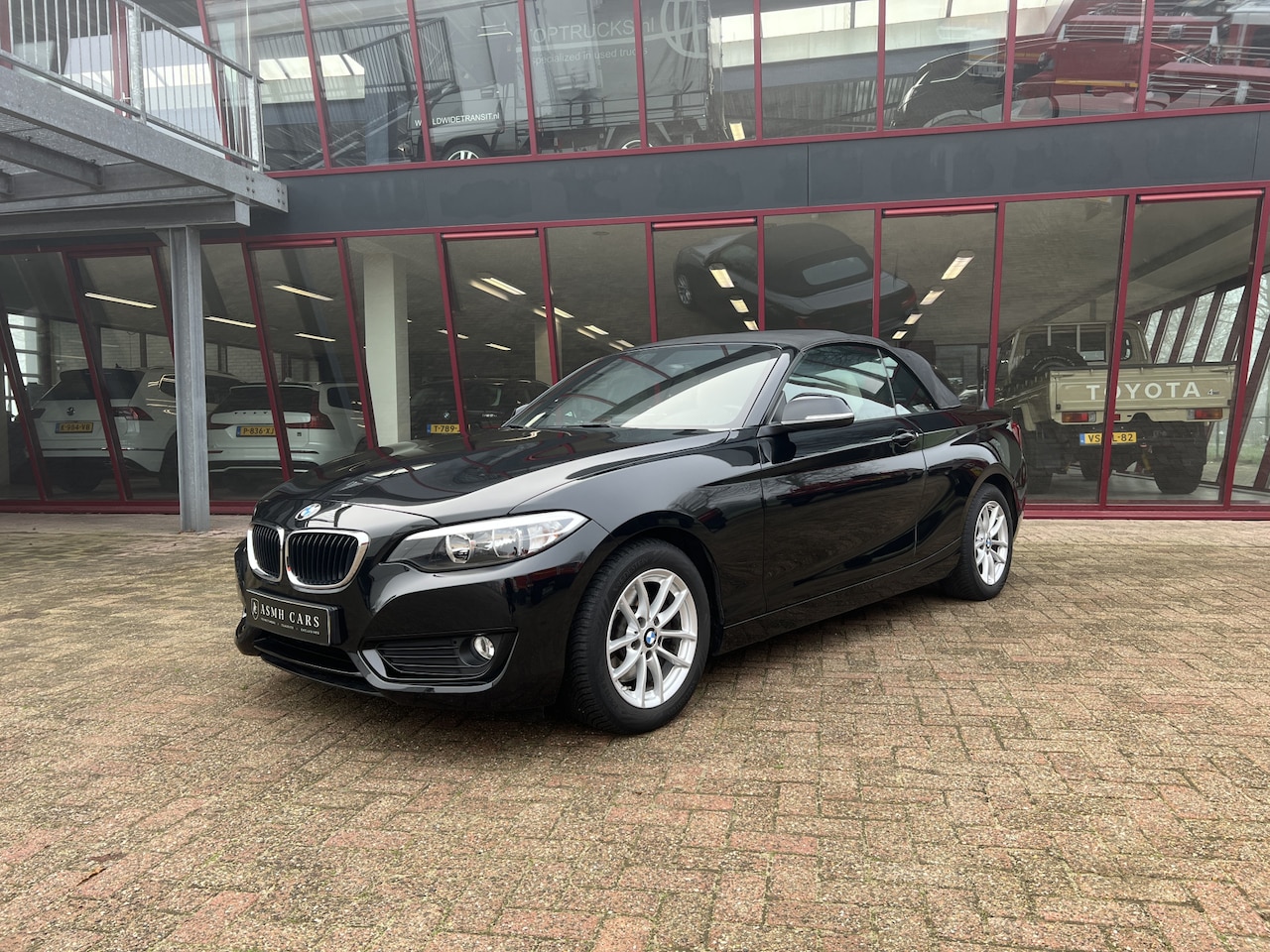 BMW 2-serie Cabrio - 220i | NL auto | 2e eigenaar | PDC | Navi | Leder | Stoelverw. - AutoWereld.nl