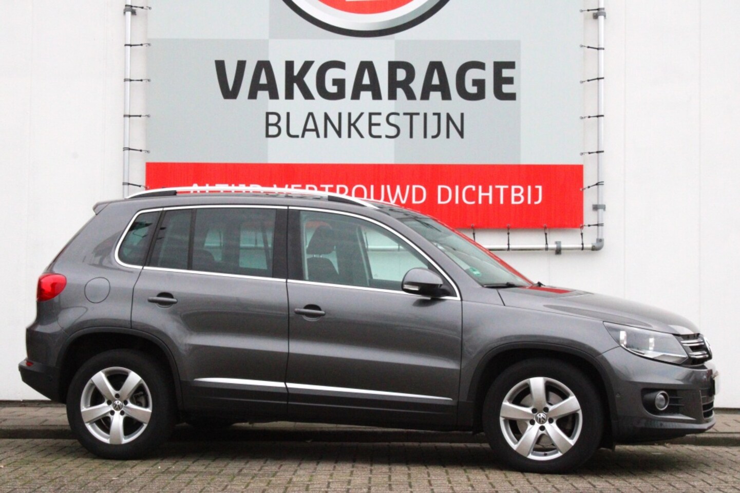 Volkswagen Tiguan - 1.4 TSI Sport&Style + Trekhaak electrisch wegklapbaar - AutoWereld.nl