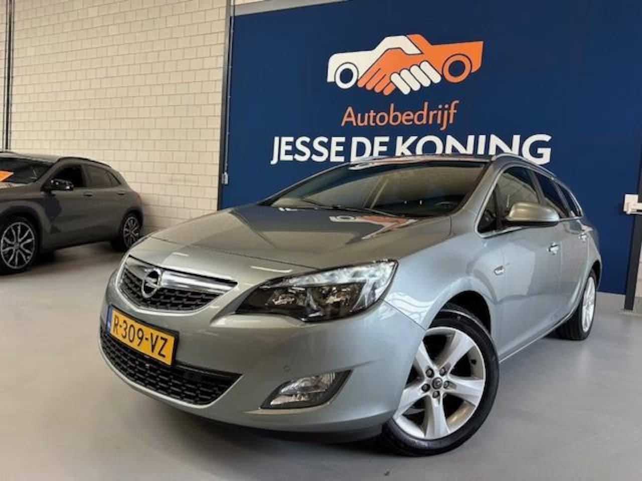 Opel Astra Sports Tourer - 1.4 Turbo Edition Stationwagen / bj.2012 / climate / sportvelgen / cruise / NAP met 176726 - AutoWereld.nl