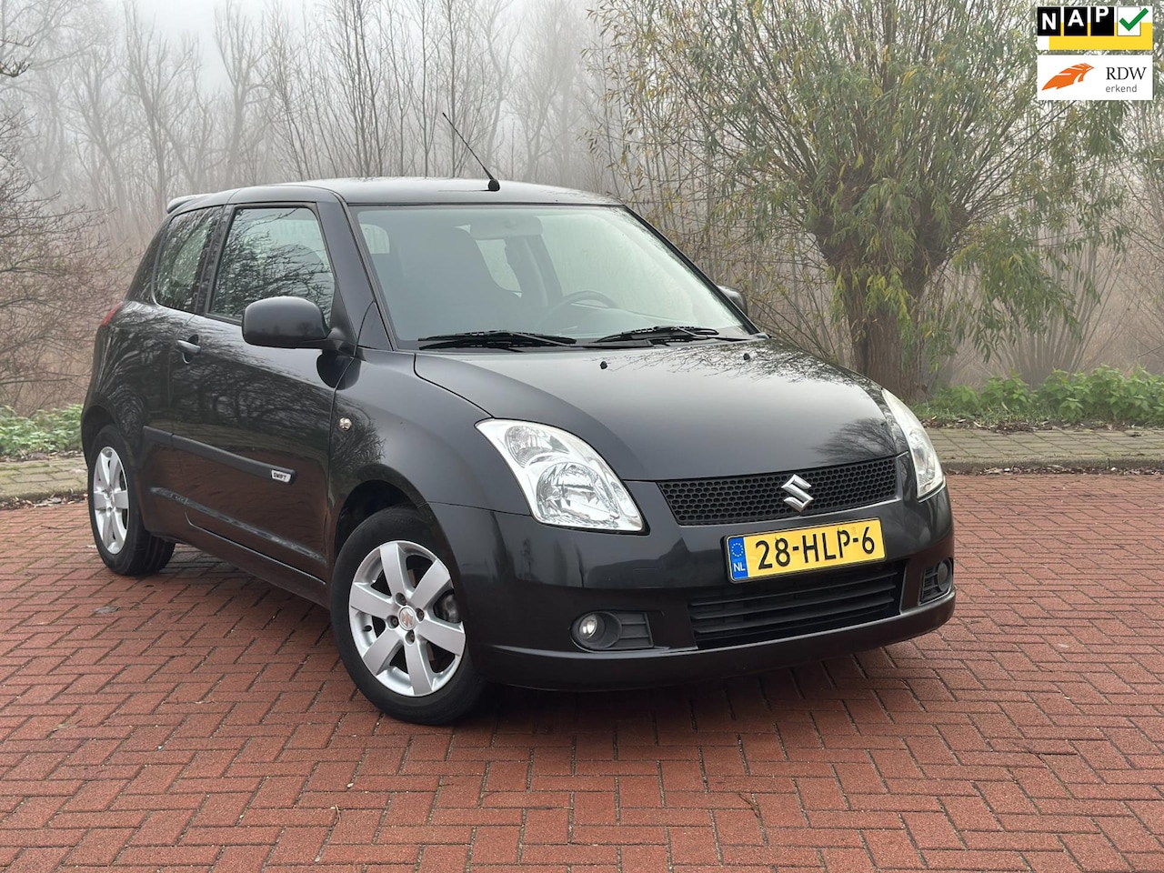 Suzuki Swift - 1.3 Bandit Race stoelen/Sport/Climate/KEYLESS ENTRY - AutoWereld.nl