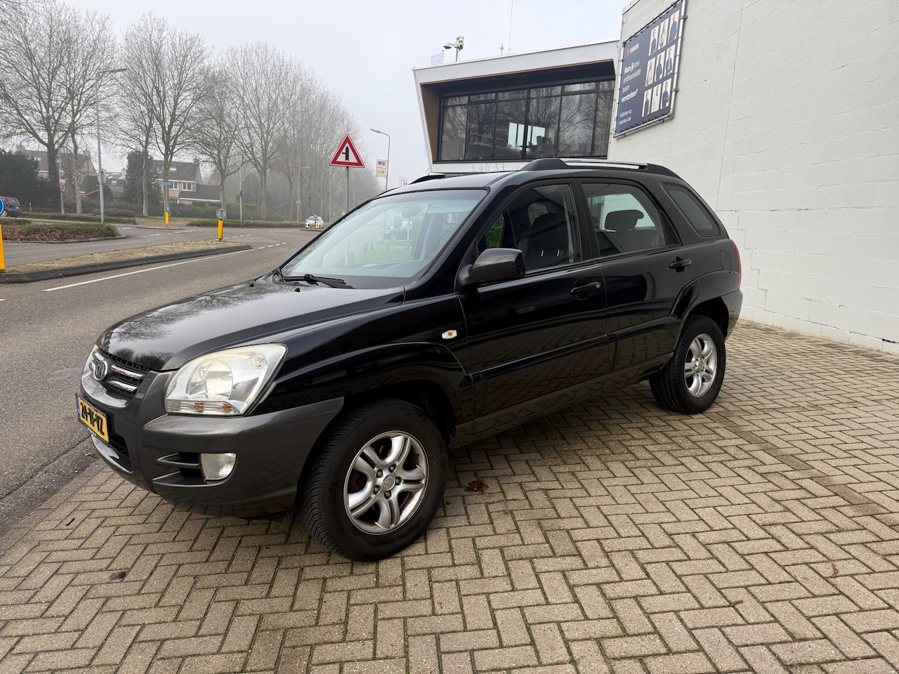 Kia Sportage - 2.0 CVVT Executive 2.0 CVVT Executive - AutoWereld.nl