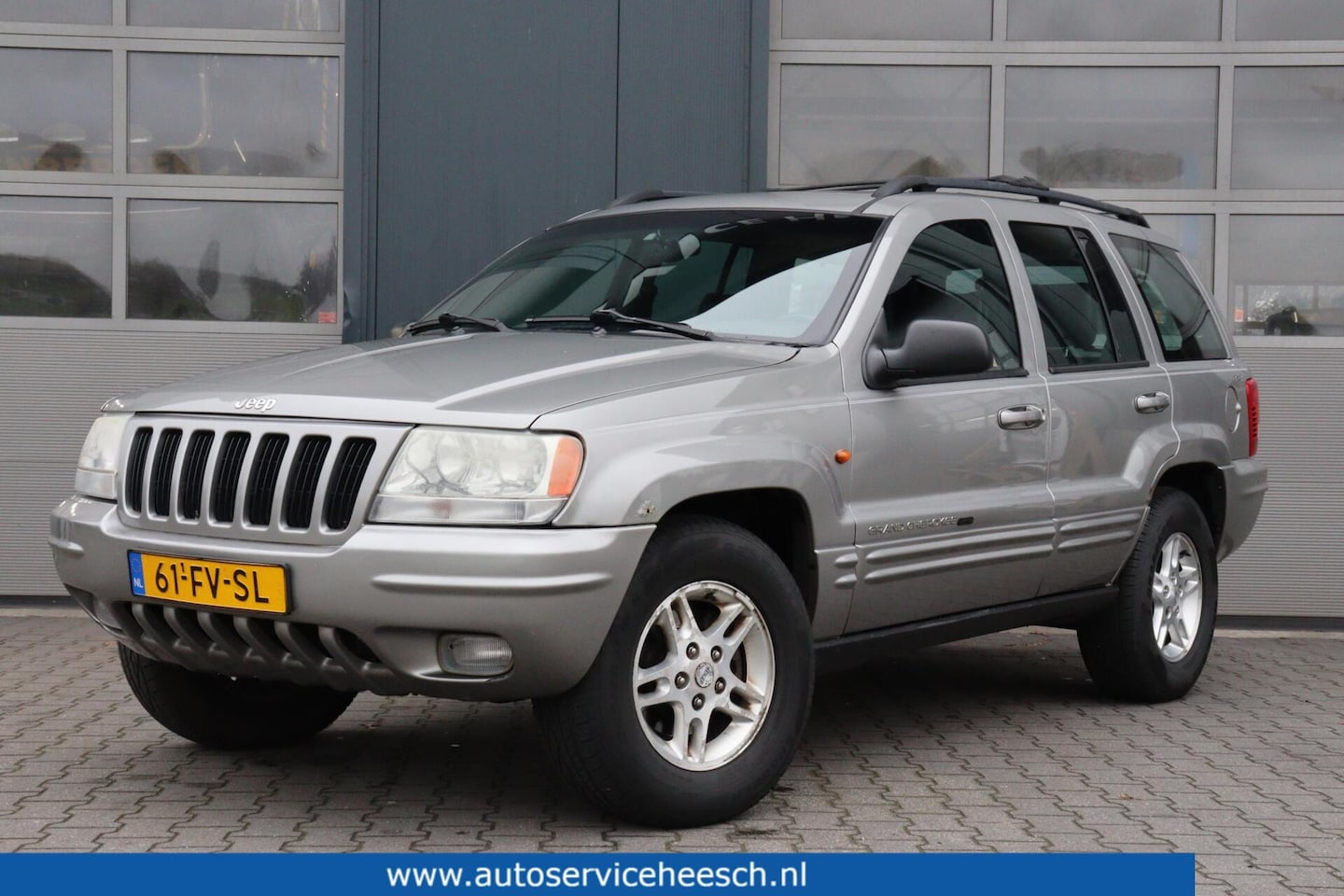 Jeep Grand Cherokee - 4.7i V8 LIMITED l AUTOMAAT l APK 10-'26 l TREKHAAK l AIRCO l INRUIL KOOPJE - AutoWereld.nl