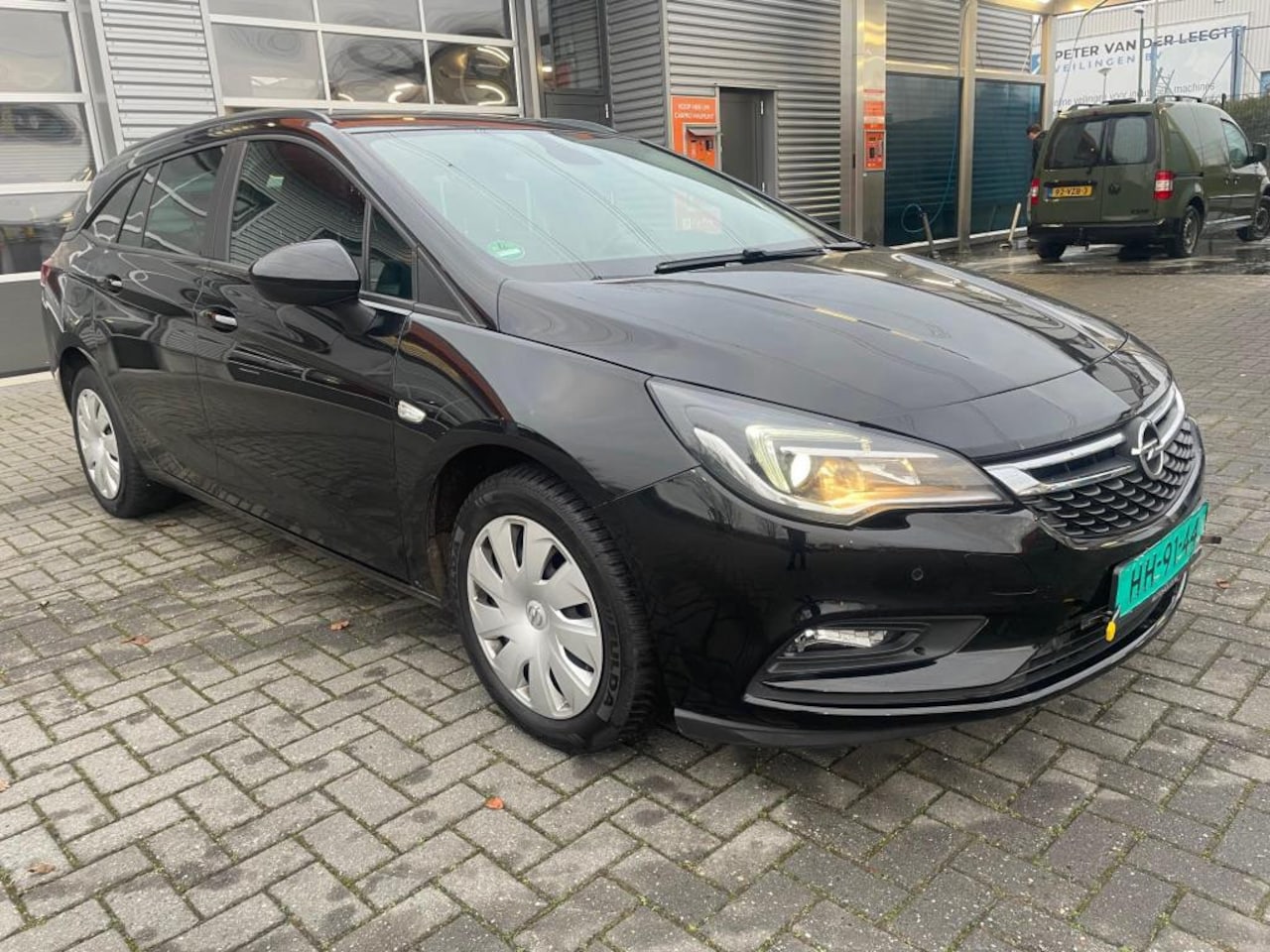 Opel Astra Sports Tourer - 1.0 Turbo Business Executive Navigatie - AutoWereld.nl