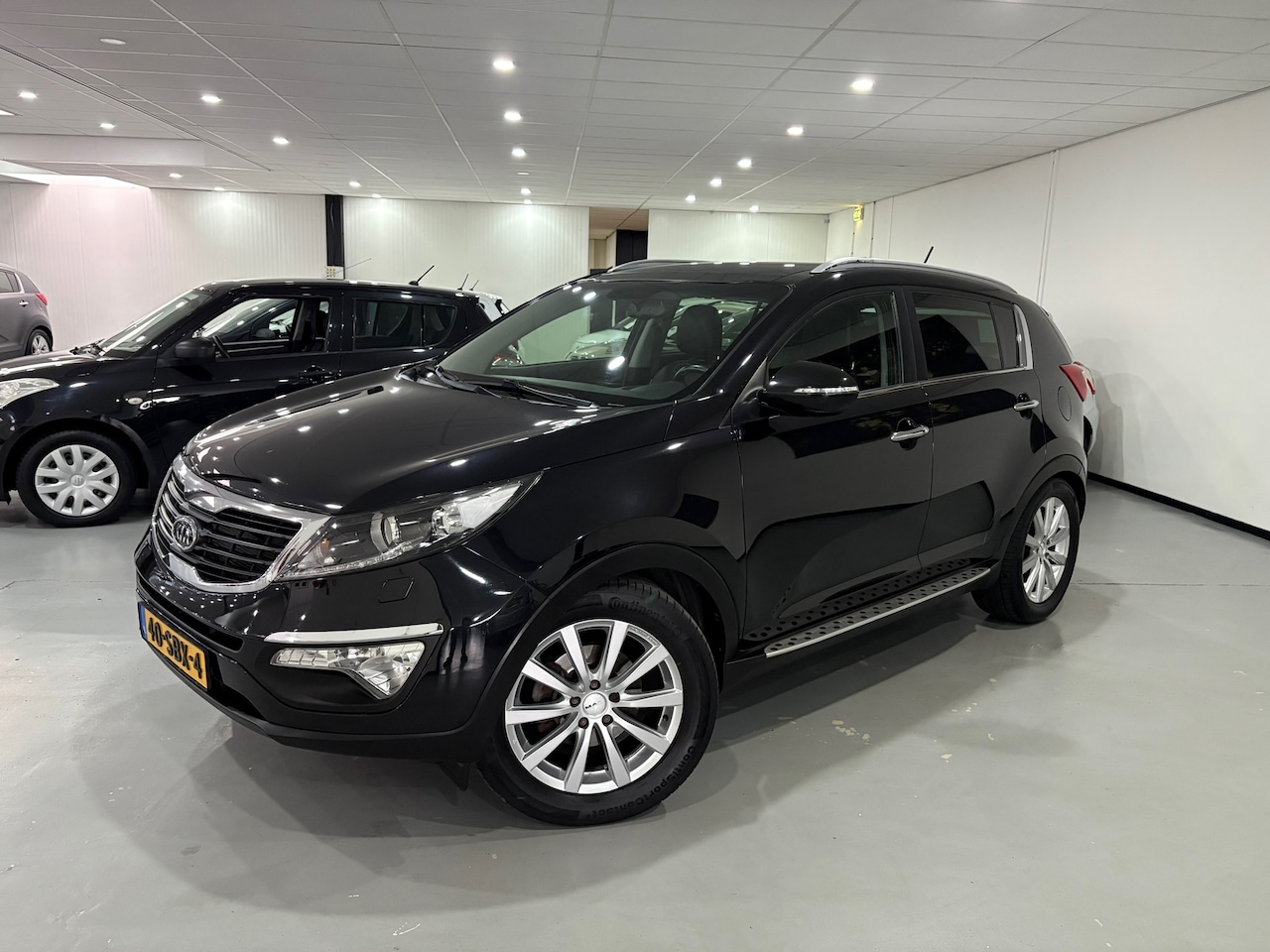 Kia Sportage - 2.0 X-clusive 2.0 X-clusive - AutoWereld.nl