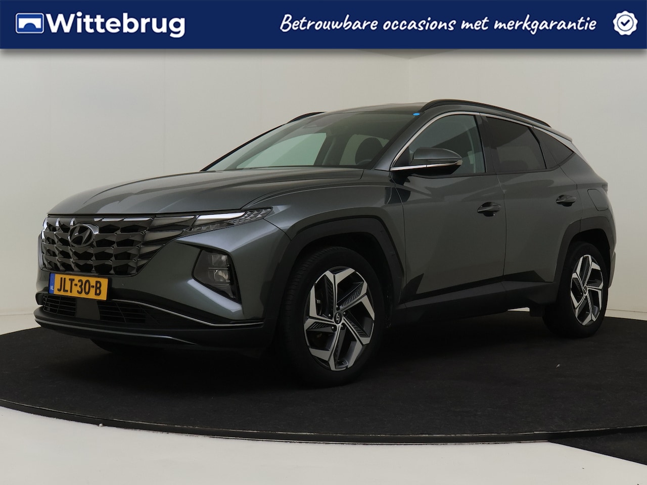 Hyundai Tucson - 1.6 T-GDI HEV Comfort Smart 19 INCH VELGEN | STOEL + STUURVERWARMING | AUTOMATISCHE ACHTER - AutoWereld.nl