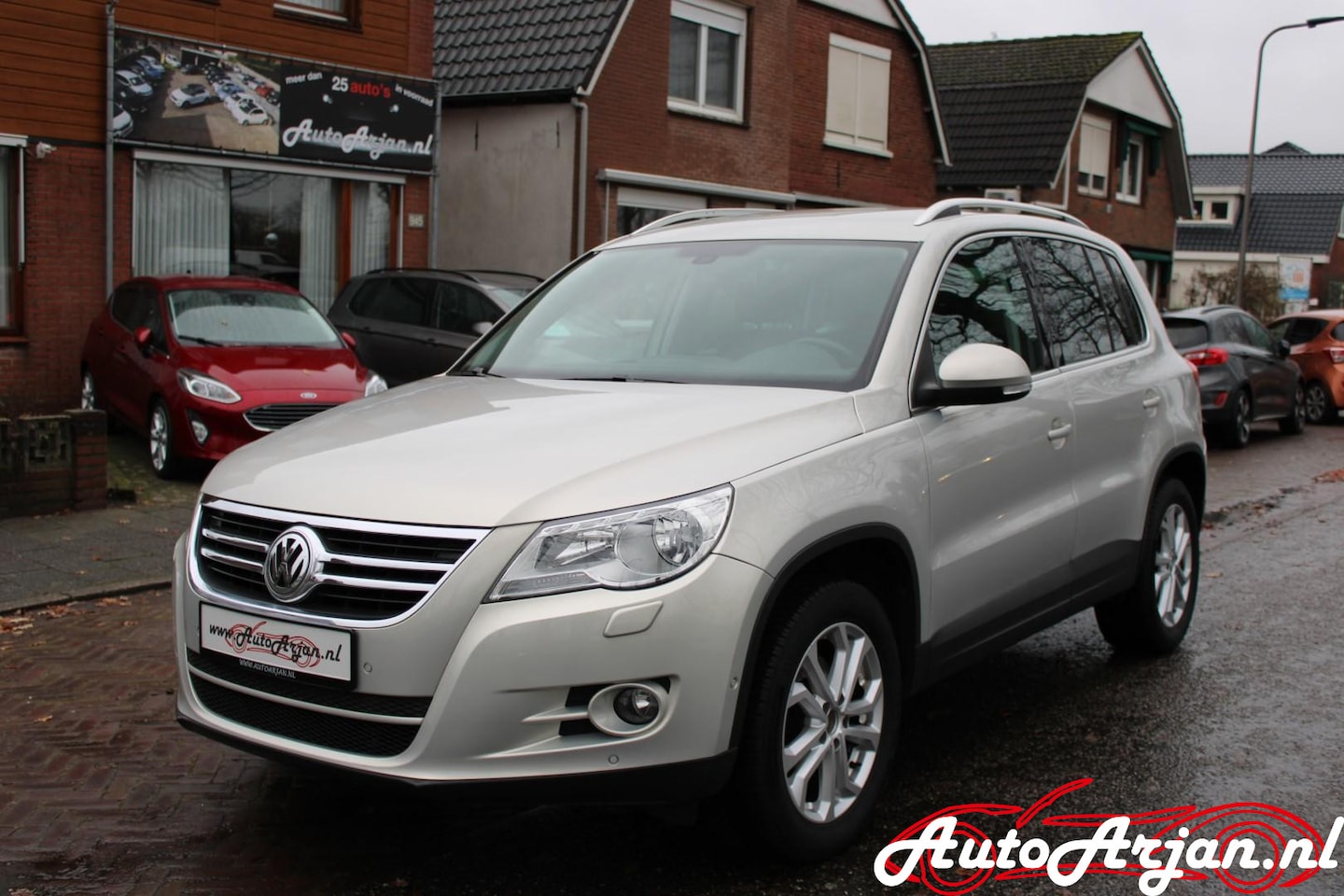 Volkswagen Tiguan - 1.4 TSI Sport&Style Navi, Cruise, Trekhaak, Garantie - AutoWereld.nl