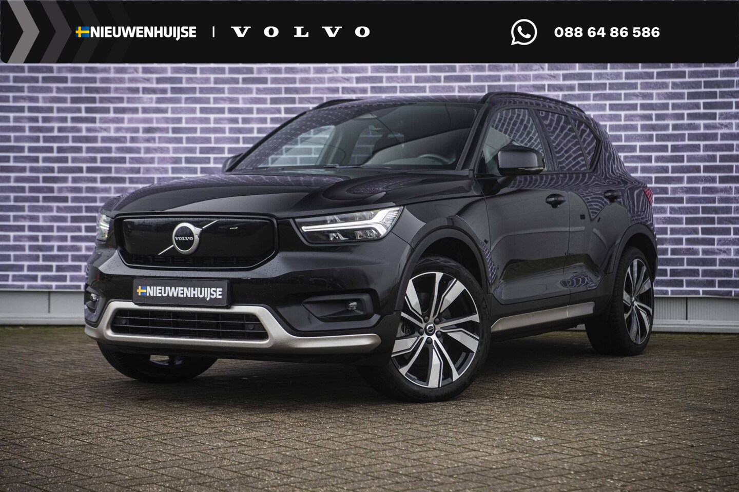 Volvo XC40 - Recharge P8 AWD R-Design | Stoel en Stuurverwarming | Donker Glas | 94% SOH | Parkeercamer - AutoWereld.nl