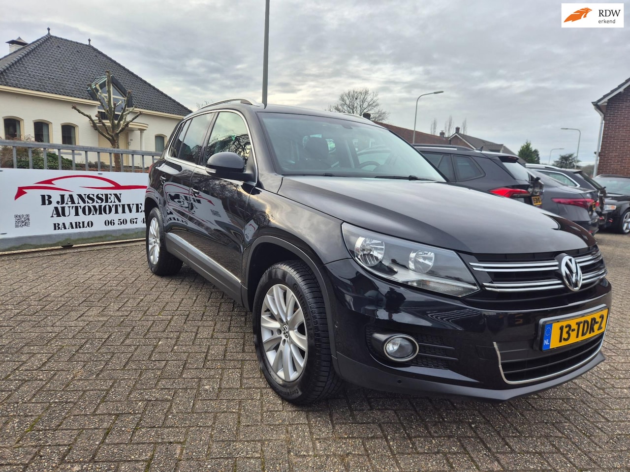 Volkswagen Tiguan - 1.4 TSI Sport&Style Apple carplay/Android auto - AutoWereld.nl