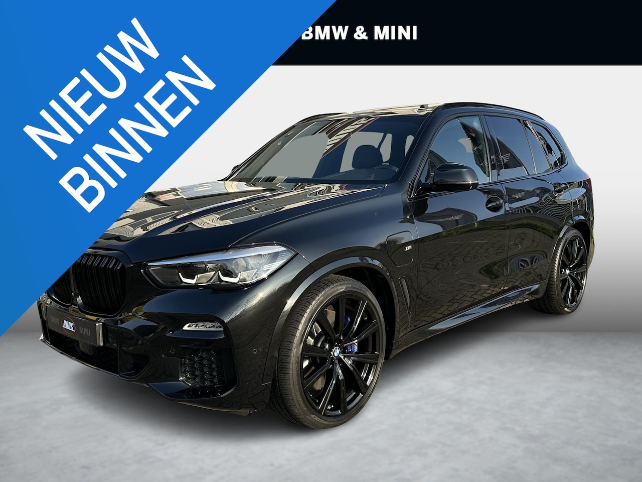 BMW X5 - xDrive45e High Executive M-sport | Pano | 22inch | Zwart/Zwart - AutoWereld.nl